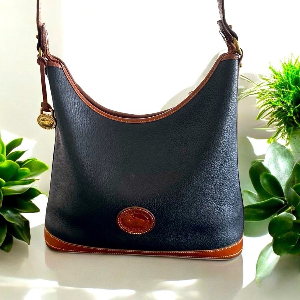Black leather Dooney and Bourke purse.